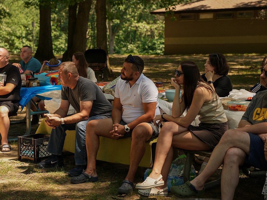 Members of New Hope Slavic Church sitting together at a church gathering